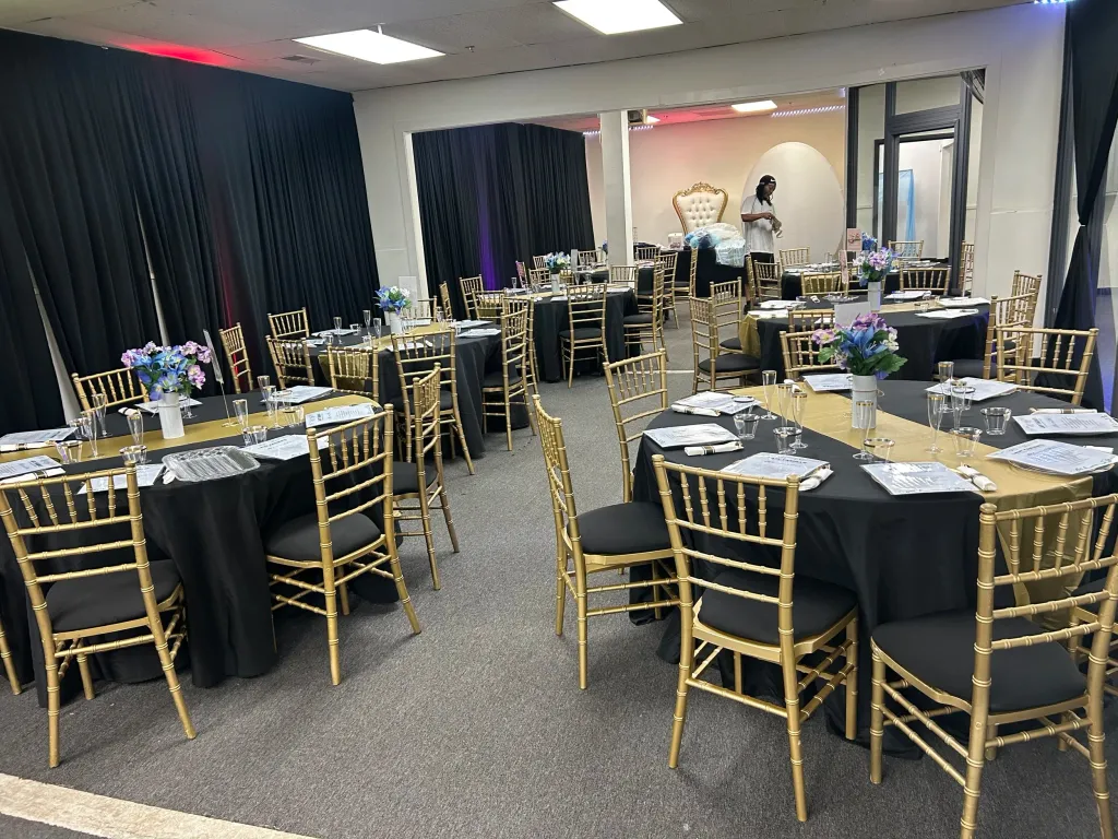 A&C Event Space set for a black and gold banquet